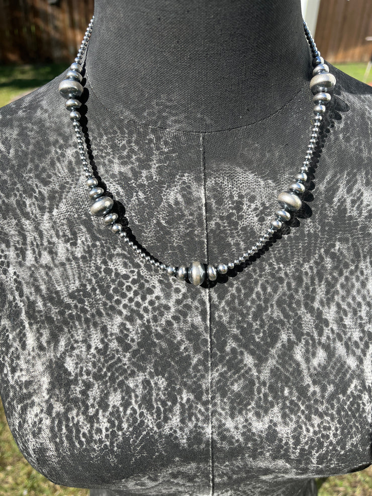 20" Triple Graduated Rondelle "Navajo Style" Pearls