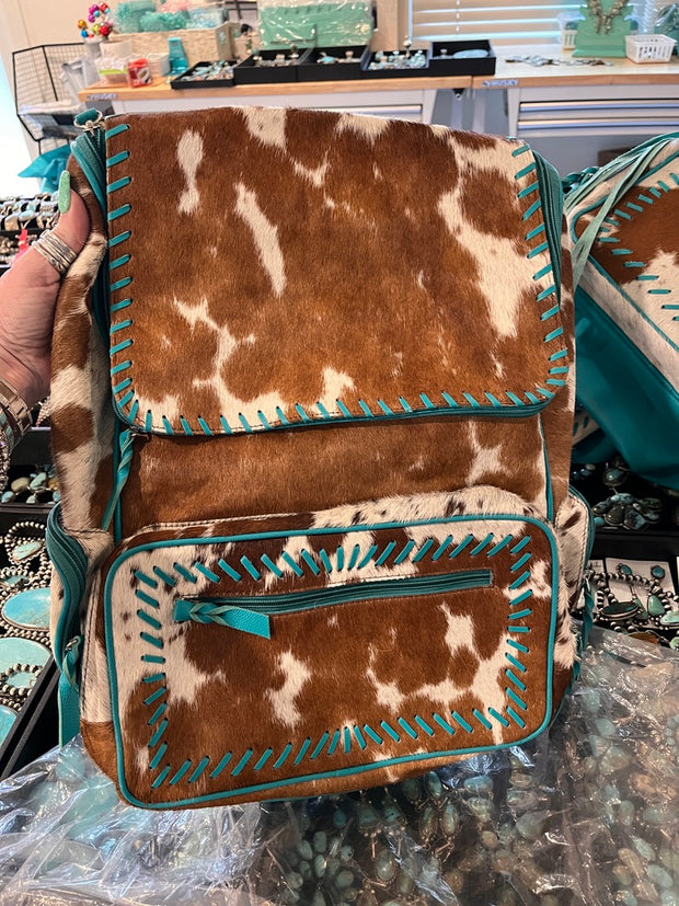 Brown and White Cowhide and Turquoise Backpack