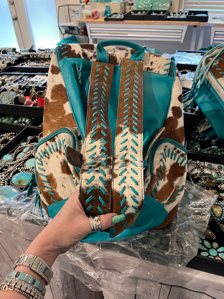 Brown and White Cowhide and Turquoise Backpack