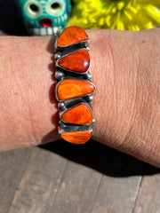 5 Stone Orange Spiny Cuffs #1-2