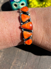 5 Stone Orange Spiny Cuffs #1-2