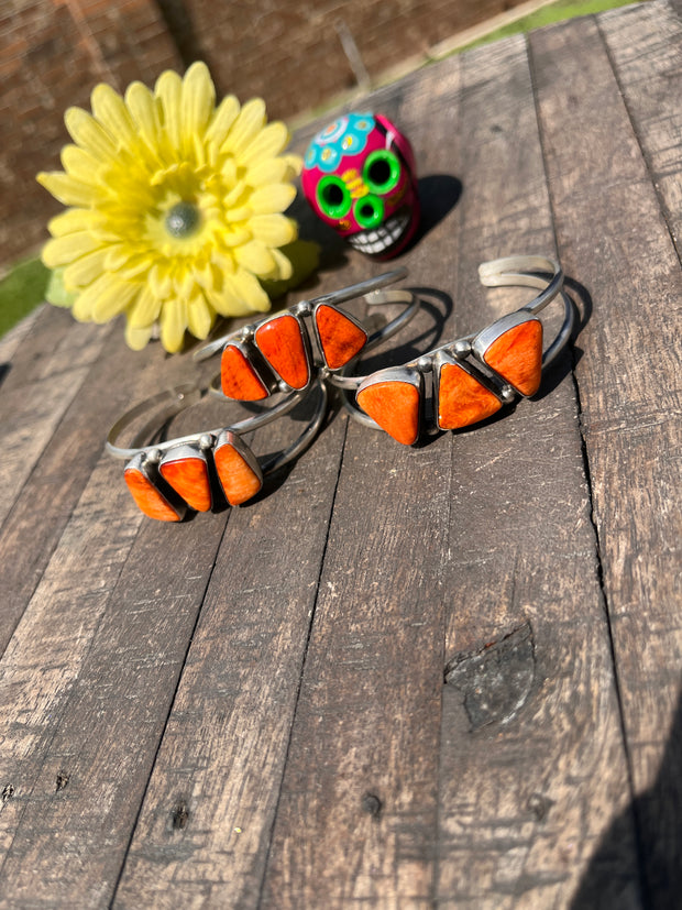 3 Stone Orange Spiny Cuffs 1-3