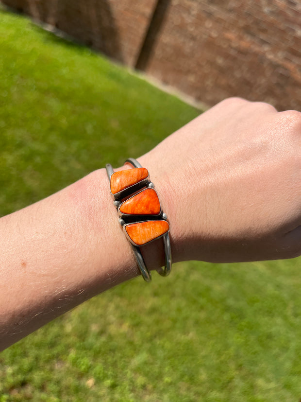 3 Stone Orange Spiny Cuffs 1-3