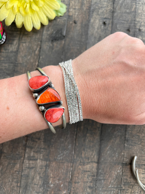 3 Stone Red Spiny Cuffs 1-5